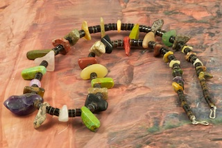 Stunning Native American Necklace with Genuine Assorted Gemstones. Featuring Genuine Turquoise, Amethyst, Red Jasper, Wild Horse, Rose Quartz and Pen Shel Heishi.  The photo is of the Necklace you will be receiving. Created by Santo Domingo Artist Carol Pacheco. The Santo Domingo Pueblo is in New Mexico, near Santa Fe. 