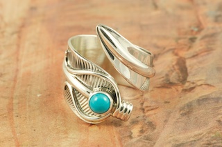 Genuine Sleeping Beauty Turquoise set in Sterling Silver. This heavy gauge Sterling Silver Ring can not be adjusted for size. The Sleeping Beauty Turquoise mine is located in Gila County, Arizona. Created by Navajo Artist Freddy Charley. Signed by the artist.