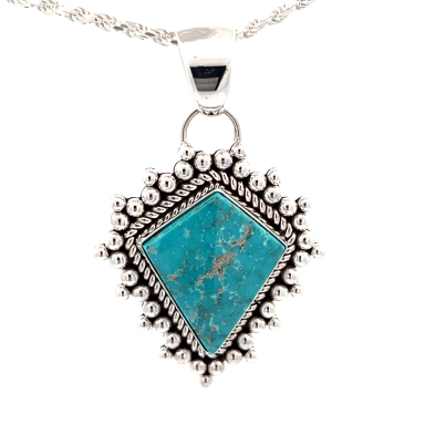 Mongolian Turquoise Sterling Silver Pendant by Navajo Artist Artie Yellowhorse